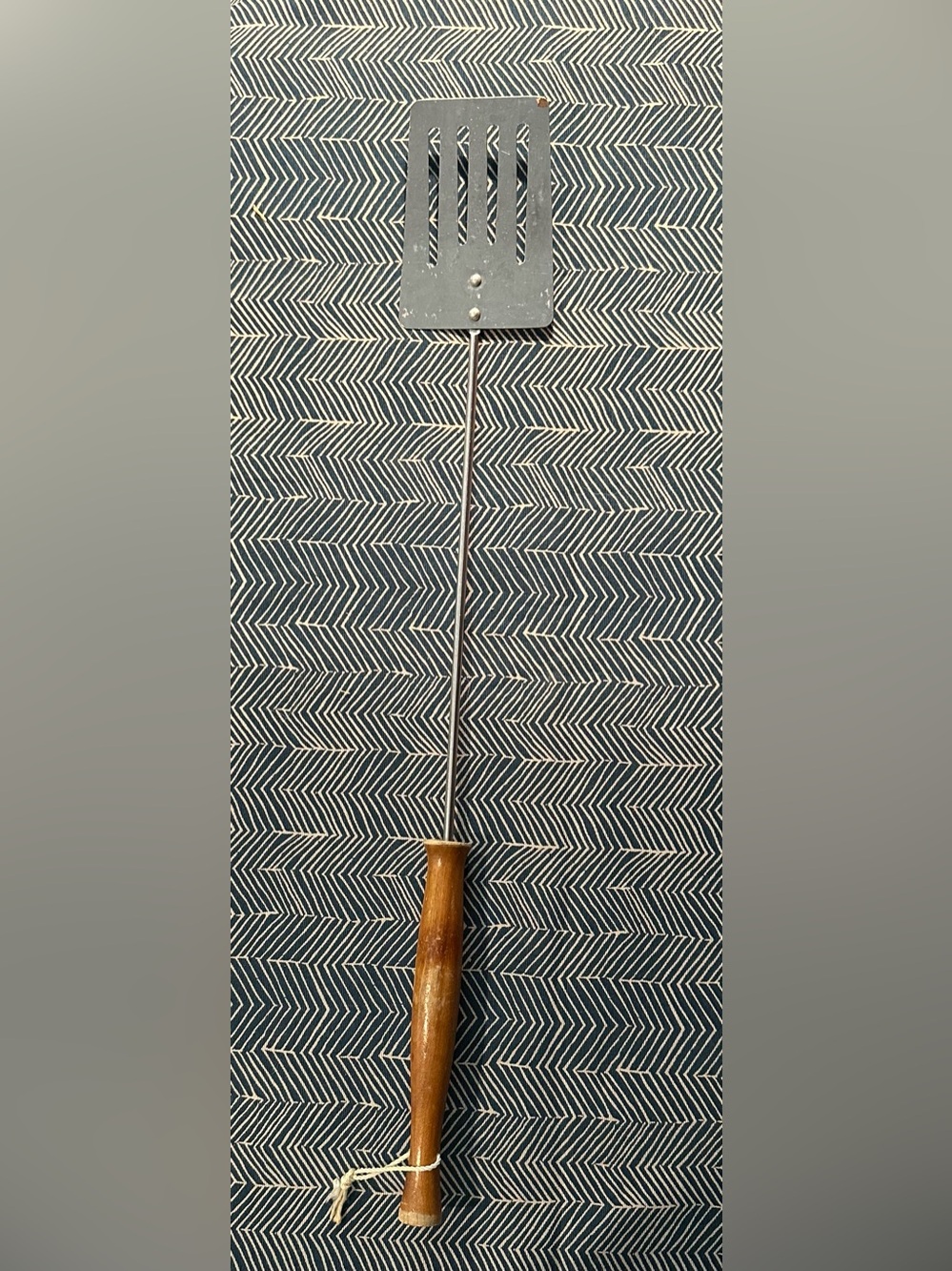 Wooden handled grill spatula • hangs